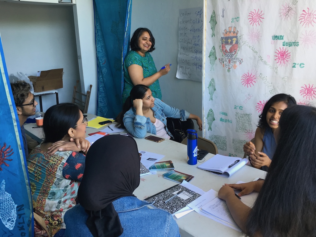 Roohi teaching a class of students
